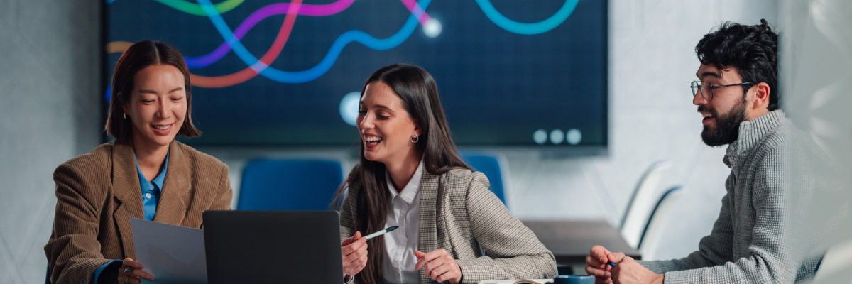 Coworkers smiling and laughing together