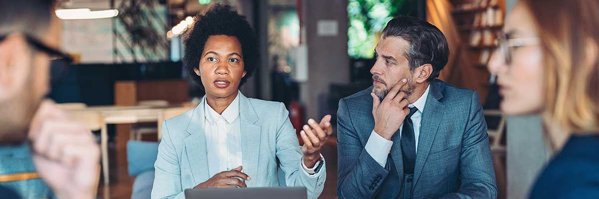 What’s the difference between disaster recovery and business continuity? + 3 encouraging takeaways People having a meeting