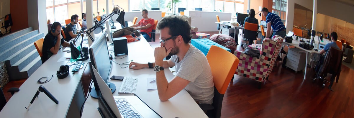 Our highest priority is to satisfy the customer through early and continuous delivery of valuable software Developer reading over code