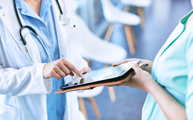 Doctor signs on tablet device using Adobe Acrobat Sign