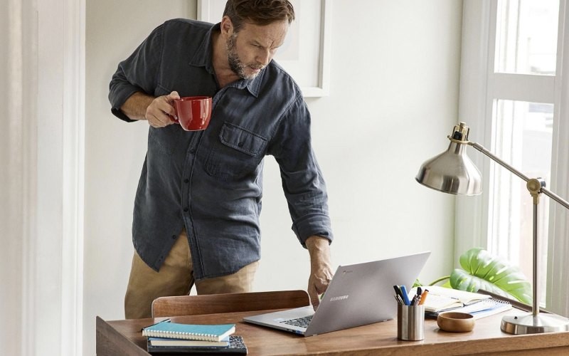Woman working from home on laptop computer