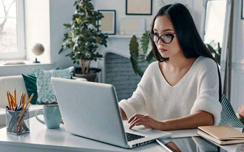 Businesswoman on desktop computer