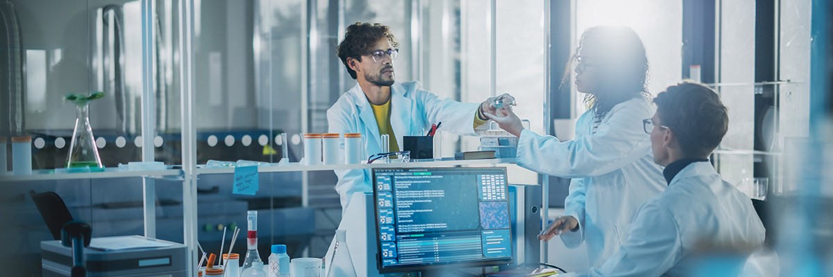 Biotech Firm Accomplishes International Migration to Cloud Users in lap room with digital technology