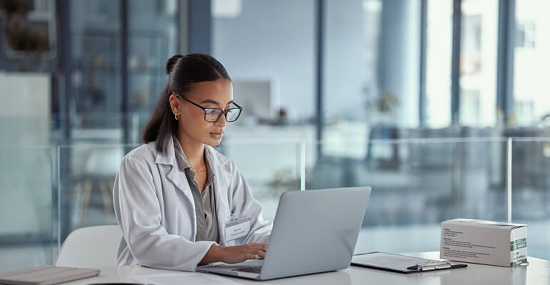 Doctor working on the computer
