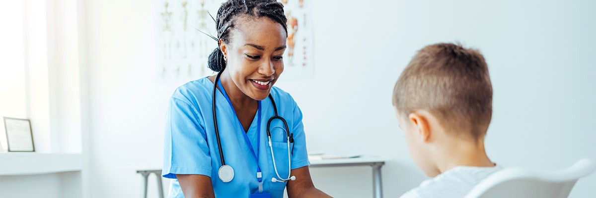 Children's Healthcare Organization Improves Patient and Family Experiences With Modern Apps Healthcare working caring for child patient