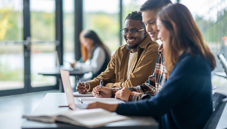 Students working on a laptop