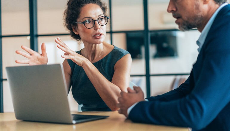 Questrade Financial Group transforms productivity using Google Workspace with Gemini People having a serious conversation