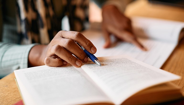 Student working in classroom studying