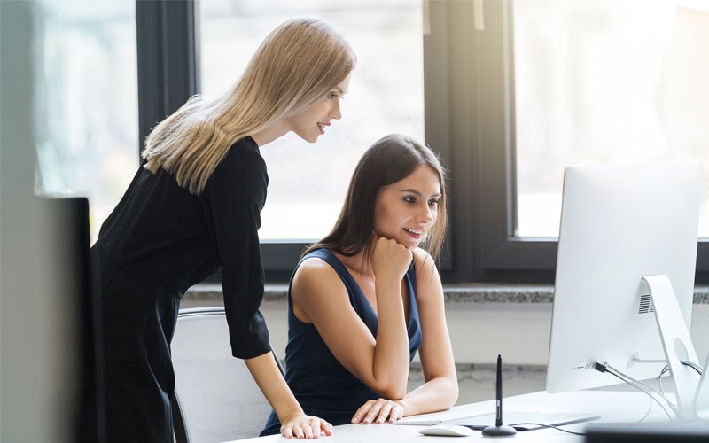 Business woman working on laptop computer