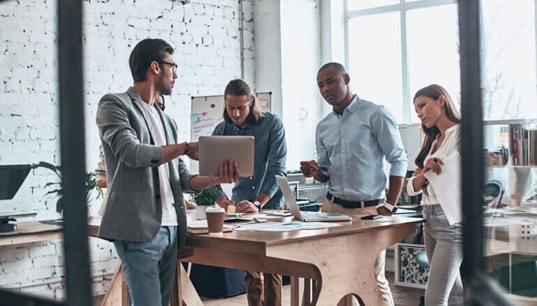 Business colleagues collaborating with the newest technology