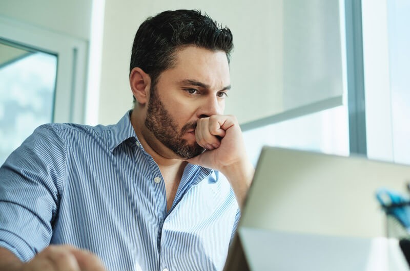 Business professional checking his safe data 