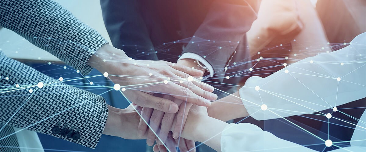 Hands in a huddle. Partner ecosystem, IT partners, Artificial Intelligence