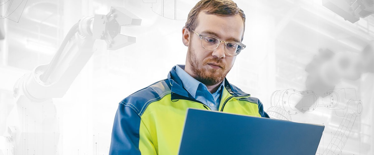 Engineer on laptop computer. Automation, workforce automation, retail automation, back office automation, automation technology