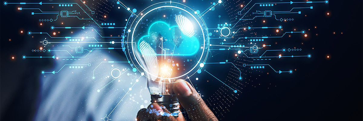 Guy holding a lightbulb representing cloud.