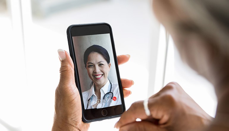 Patient with telehealth doctor. Global Telehealth Services, Remote Patient Monitoring, flatten the curve at the point-of-care