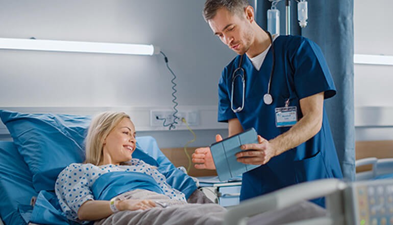 Nurse talking with patient