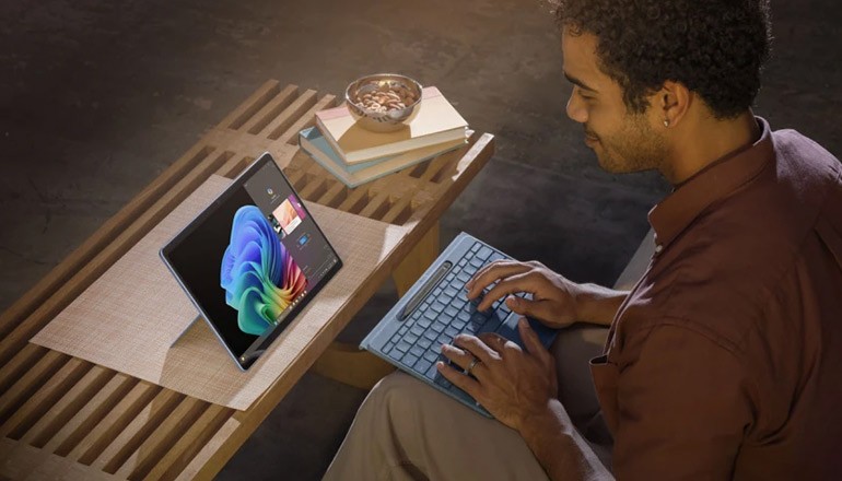User working on Microsoft Surface Copilot device