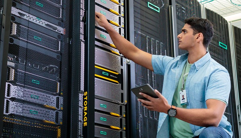 Close up of man working in data center with HPE Nimble
