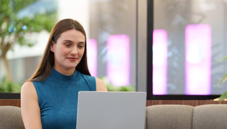 Business professional using Windows 11 Pro on Surface Pro device. Windows 11, productivity, collaboration, IT investments