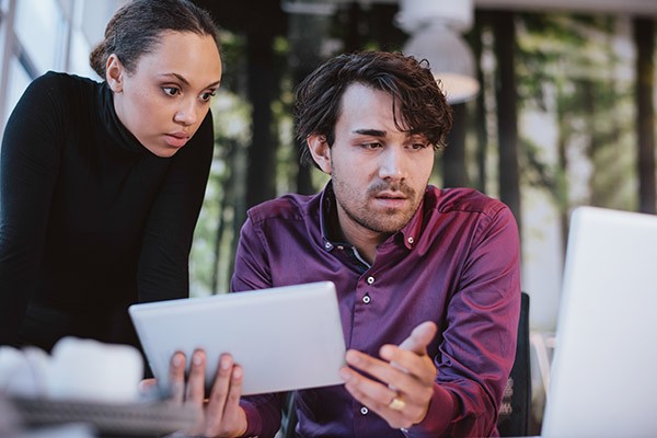 Team discusses data found on notebook computer