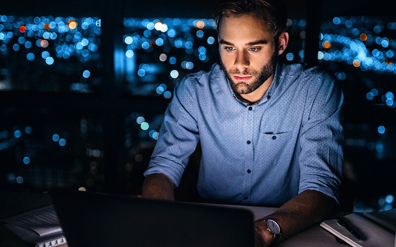 CloudGen Firewall Man working late at the office
