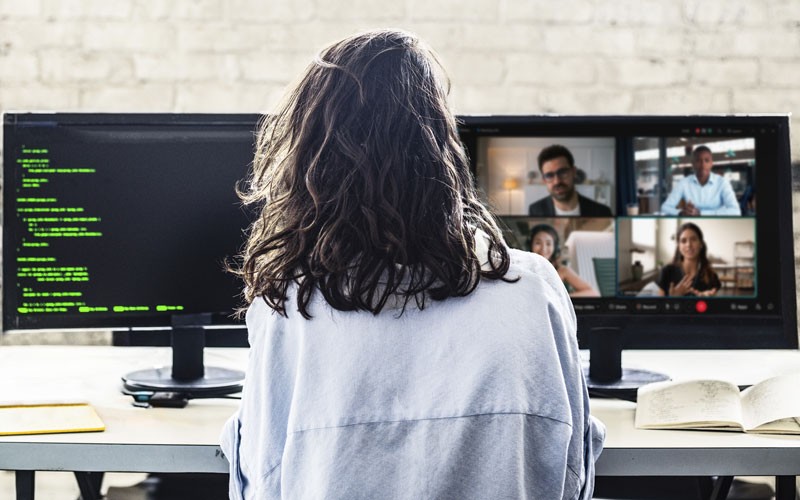 Cisco Full-Stack Observability keeps our IT resources and users safe Woman using Cisco security solutions