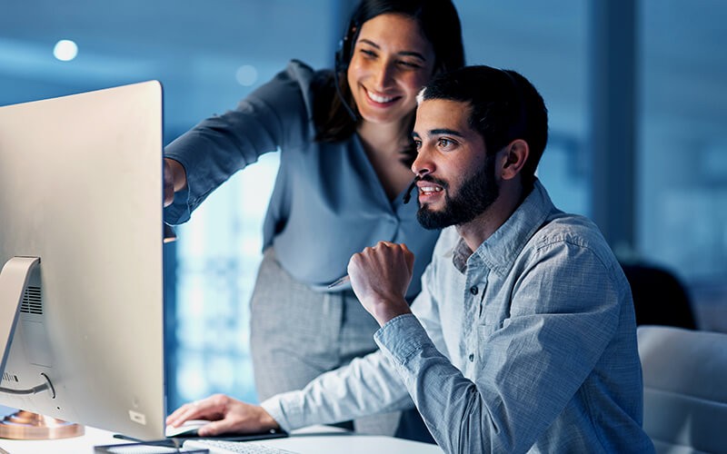 Two person collaborating with each other