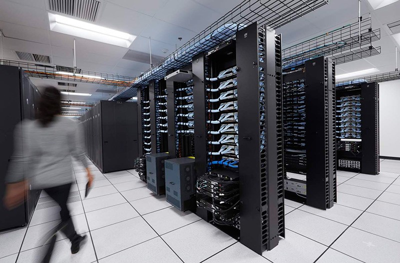 Woman walking through Dell data center