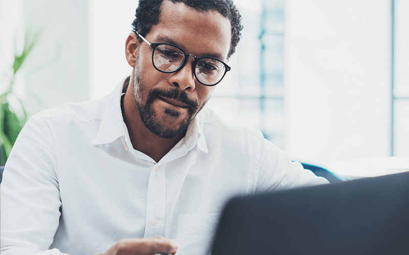 Man working using a laptop