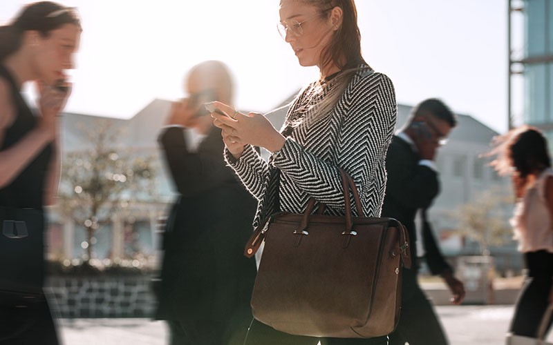 Woman using her gadget