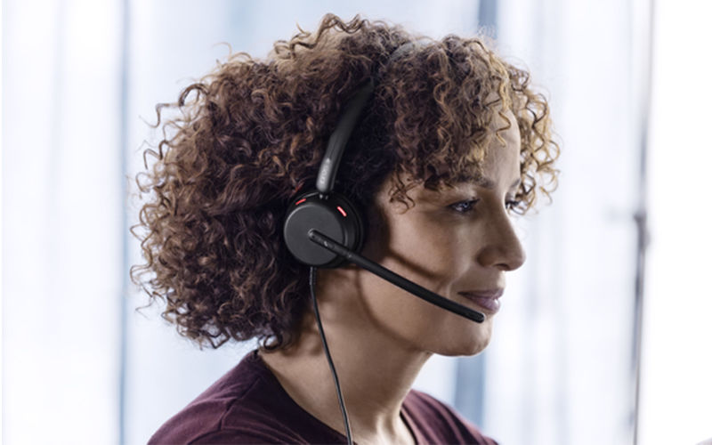 Woman using ADAPT headset