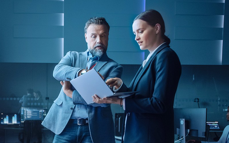 Teammates collaborating together at the office