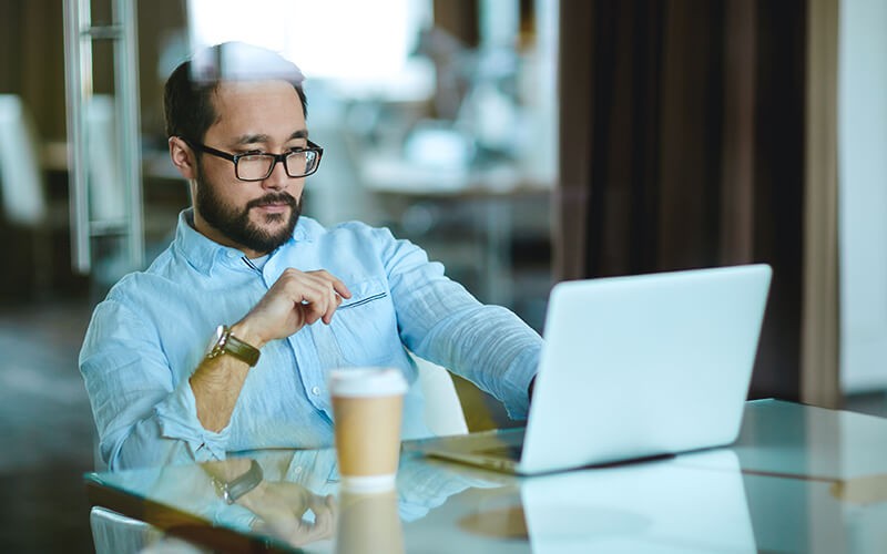 Man working using a laptop