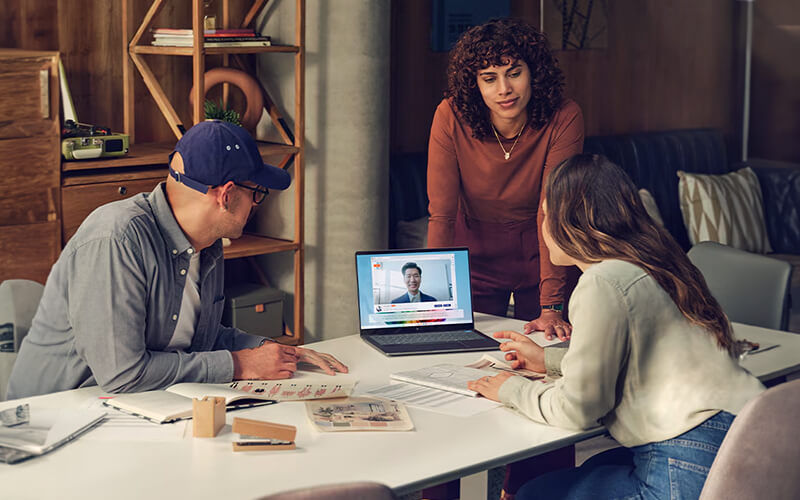 Teammates working together at the office