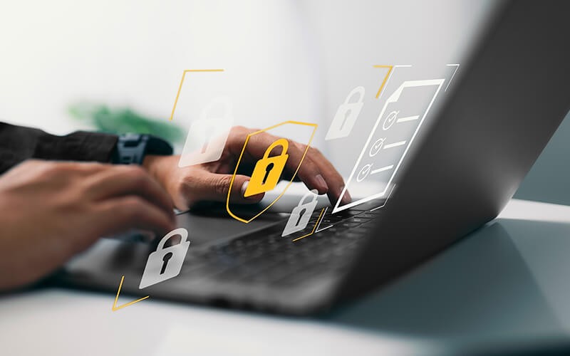 Person typing on laptop