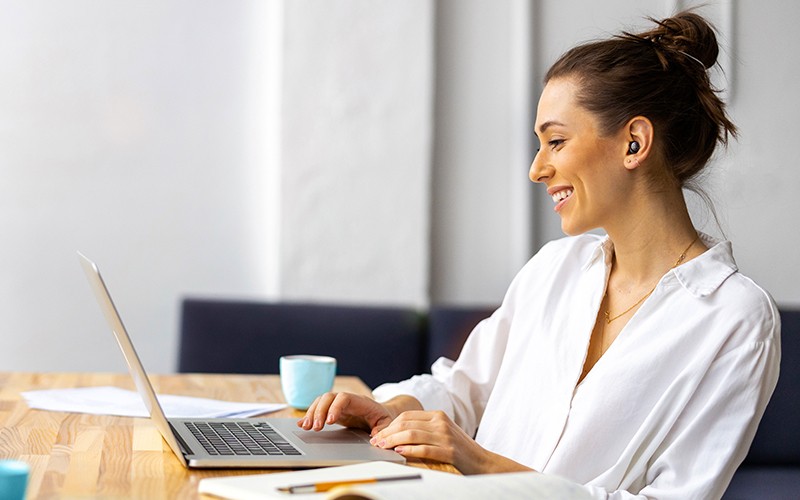 Woman working using JLab TWS