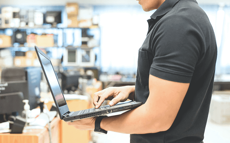 Technician using laptop