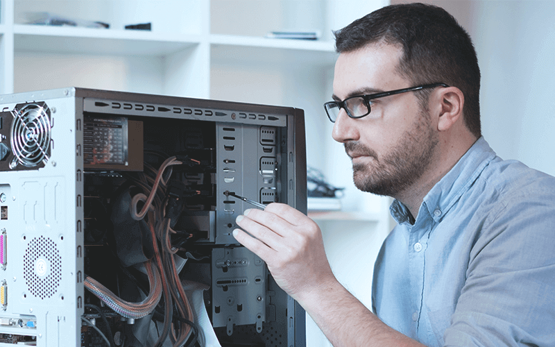 IT repairing a computer