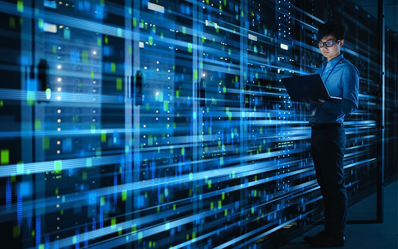 Woman using Lenovo device traveling