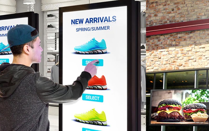 Man using a touch-screen monitor