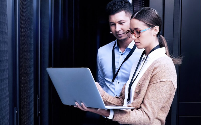 Teammates collaborating together at the office