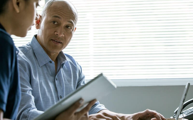 Two professionals collaborating