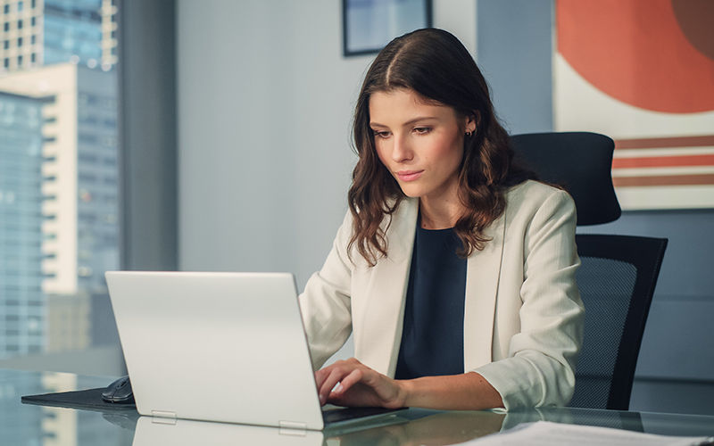 Professional using laptop