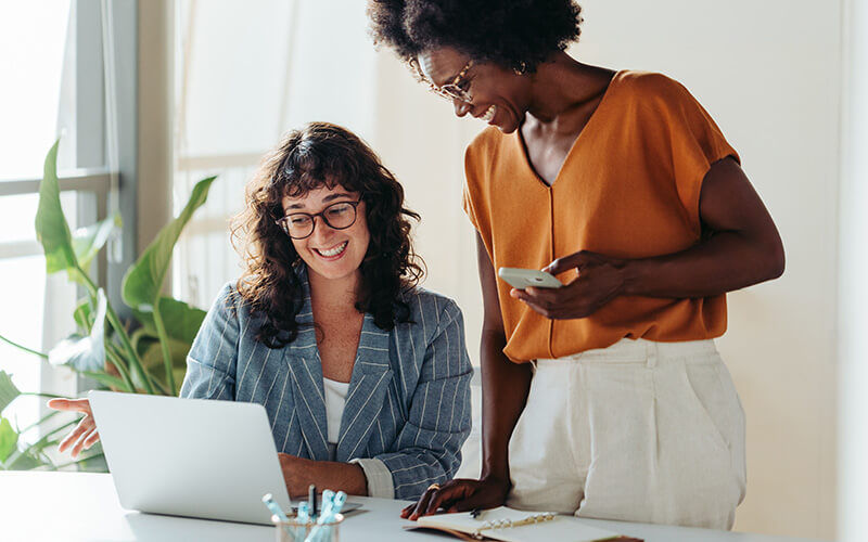 Teammates working together at the office