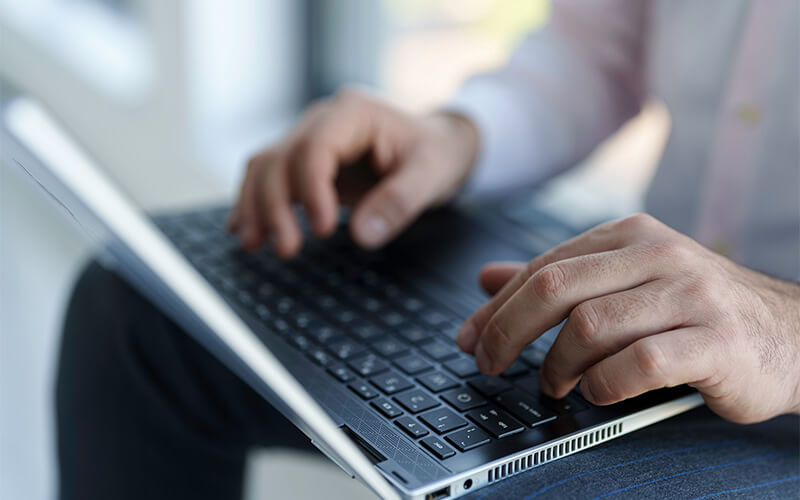 Person using a laptop at work