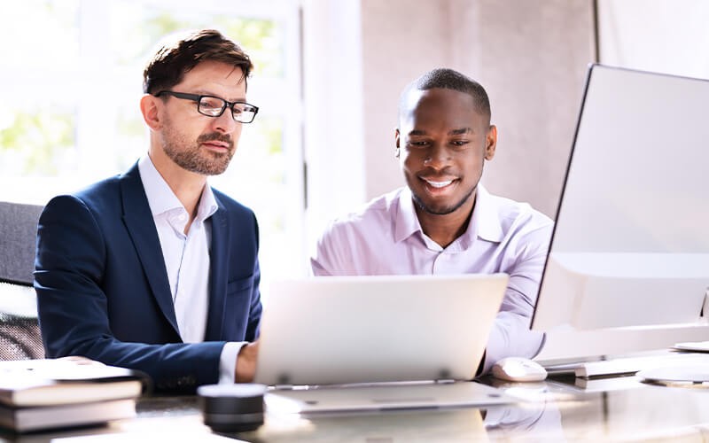 Teammates working together at the office