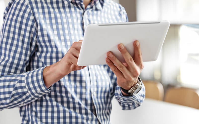 Man holding tablet