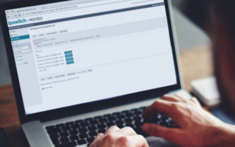 Hands on device showing MOVEit product