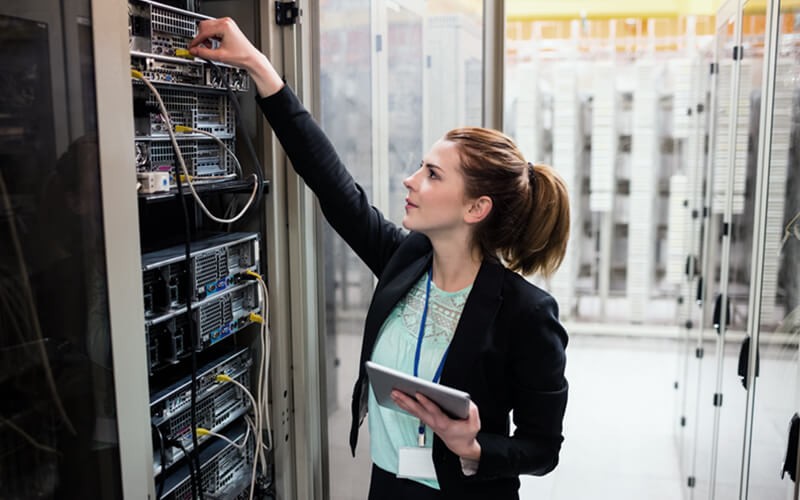 Woman looking in data center