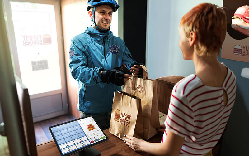 Delivery guy getting the products